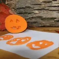 Crafting Cheerful Jack-O-Lanterns with Potato Stamps